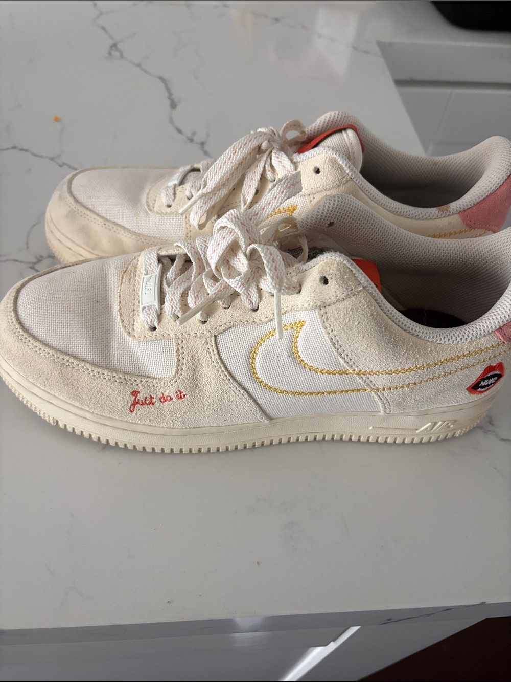 Nike Low-Top Sneakers in Cream with Pink and Orange Details